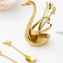 Suporte cisne dourado com talheres em inox para sobremesa