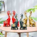 Par de elefantes decorativos em resina com acabamento esculpido e estilo moderno para casa ou escritório