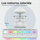 Umidificador Cloud Rain RGB com base branca liberando efeito chuva para reservatório transparente