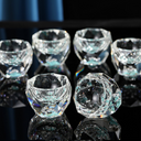 Conjunto de licor com jarra 300ml e 6 copos de 50ml em cristal. Acabamento azul e dourado. Luxo para servir com elegância.