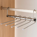Cabide dobrável de aço inox com múltiplas hastes, ideal para organizar calças e otimizar o espaço do guarda-roupa.