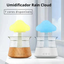 Umidificador Cloud Rain RGB com base branca liberando efeito chuva para reservatório transparente