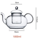 Chaleira de vidro com infusor 800ml sobre chama de fogão com chá borbulhando - Casa Splêndida