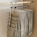 Cabide dobrável de aço inox com múltiplas hastes, ideal para organizar calças e otimizar o espaço do guarda-roupa.