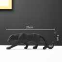 Escultura de pantera com design geométrico em resina. Elegância moderna para mesa, estante ou escritório.