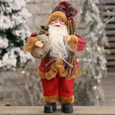 Boneco Papai Noel Tradicional vermelho Casa Splendida segurando saco de presentes, item decorativo clássico de Natal