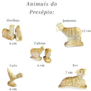 Conjunto de animais do presépio em gesso resinado, incluindo ovelhas, cabras, galo, jumento e boi.