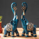 Par de elefantes decorativos em resina com acabamento esculpido e estilo moderno para casa ou escritório