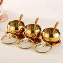 conjunto dourado com 3 potes de inox, tampas de vidro e colheres sobre bandeja – Casa Splendida