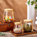 Kit com 2 potes de vidro oval com tampa de bambu e colher — beleza, frescor e funcionalidade para sua cozinha.