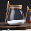 Kit com 2 potes de vidro oval com tampa de bambu e colher — beleza, frescor e funcionalidade para sua cozinha.