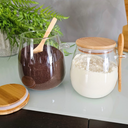 Kit com 2 potes de vidro oval com tampa de bambu e colher — beleza, frescor e funcionalidade para sua cozinha.