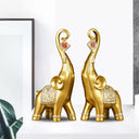 Par de elefantes decorativos em resina com acabamento esculpido e estilo moderno para casa ou escritório