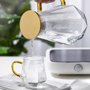 Jarra de vidro facetada estilo diamond com tampa e filtro em inox, ideal para água aromatizada com limão e gelo