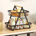 Fruteira de mesa com estrutura aramada preta e alça de madeira — charme e organização com presença decorativa.