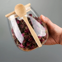 Kit com 2 potes de vidro oval com tampa de bambu e colher — beleza, frescor e funcionalidade para sua cozinha.