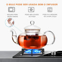 Chaleira de vidro com infusor 800ml sobre chama de fogão com chá borbulhando - Casa Splêndida