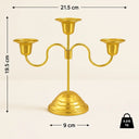Medidas detalhadas do candelabro dourado da Casa Splendida: 19,5 cm de altura e 21,5 cm de largura.