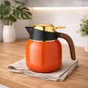Garrafa Térmica Luxo Valenza para Café e Chá 1L Laranja Casa Splendida em close sobre uma bancada
