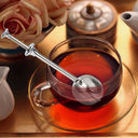 Infusor de chá com cabo e esfera perfurada em inox, tipo pinça, prático e reutilizável – Casa Splendida