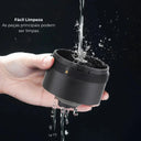 Moedor de café elétrico portátil preto com botão liga/desliga e copo transparente para café moído