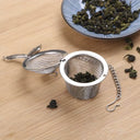 Infusor de chá e temperos em formato de cesto com corrente em aço inox de 4,5 cm – Casa Splendida