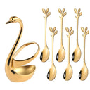 Suporte cisne dourado com talheres em inox para sobremesa