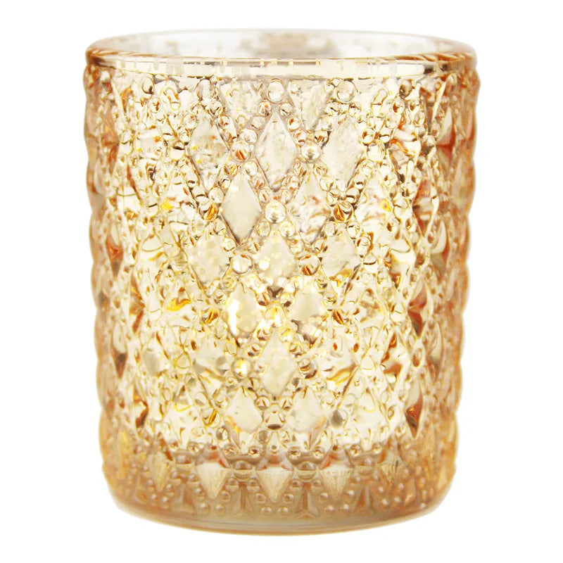 Kit 3 porta-velas de vidro dourado com textura clássica iluminados por velas