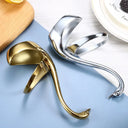 Suporte cisne dourado e prata com talheres em inox para sobremesa
