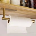 Suporte de rolo de papel dourado montado na cozinha