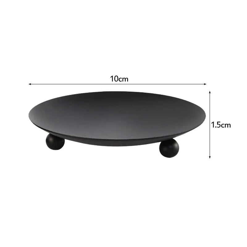 Base redonda preto de metal com três pezinhos para vela pilar