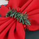 Porta-guardanapo natalino em formato de guirlanda com frutinhas vermelhas e ramos verdes – Casa Splendida, ideal para ceia de Natal.


