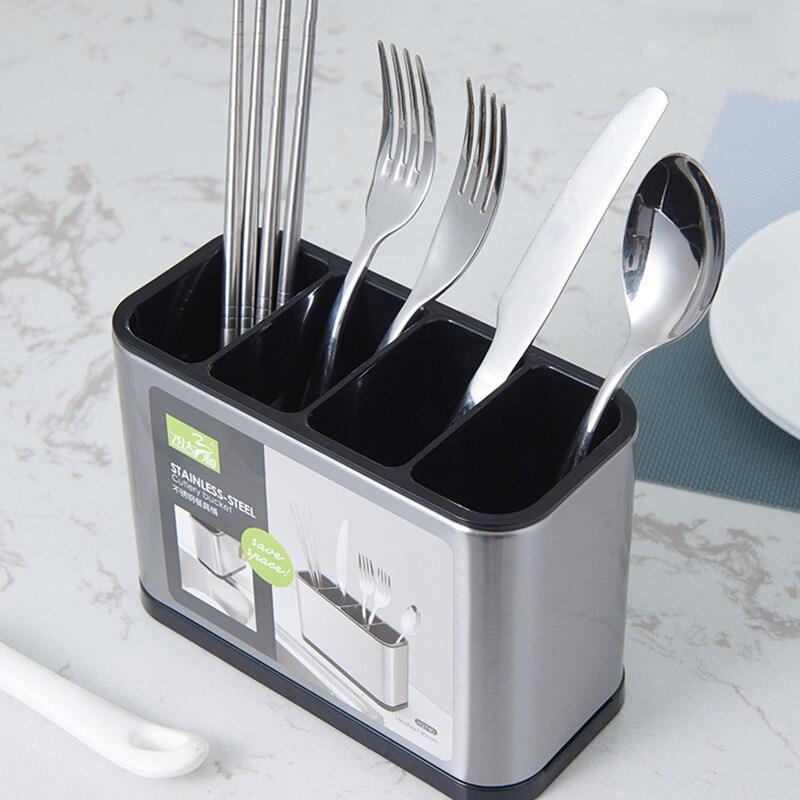 Porta talher inox de pia com design moderno e acabamento elegante sobre bancada de cozinha.