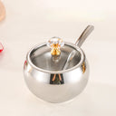 conjunto prata com 3 potes de inox, tampas de vidro e colheres sobre bandeja – Casa Splendida