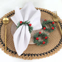 Porta-guardanapo natalino em formato de guirlanda com frutinhas vermelhas e ramos verdes – Casa Splendida, ideal para ceia de Natal.

