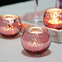 Kit 12 porta-velas de vidro Mercury rosa com acabamento metálico pontilhado