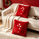 Capas de Natal com bengala doce na poltrona e junto ao piso